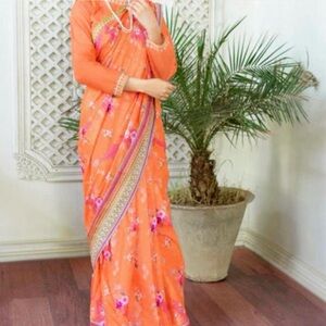 Batik Vibrant Orange Floral Saree with Decorative Border